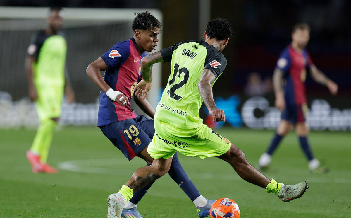 熊猫体育平台-马德里竞技豪取三分，战胜皇家社会